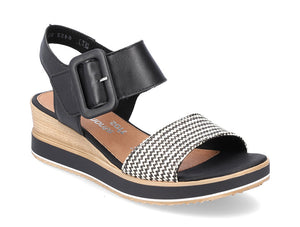 The Jerilyn by Rieker is a fun black wedge sandal and part of the Remonte collection. A low, lightweight wedge sandal with a velvety molded footbed features an adjustable strap for easy comfort and style. 