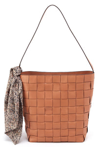 Soft vegetable tanned leather, hand woven for beautiful luxe and artisanal beauty. Scarf included. 9" W X 12.5" H X 5" D