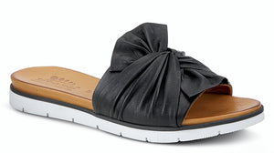 LAVONA Flexible outsole, black slip on style with a beautiful leather twist bow.