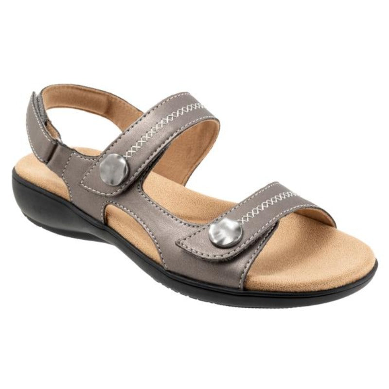 The Romi Stitch sandal in pewter has everything you love (fully adjustable straps, comfortable footbed) about the Romi sandal now with a stitch pattern on the straps topped off with an ornament.
