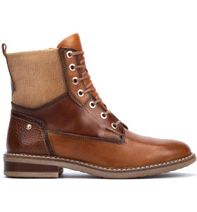 A corduroy collar brings modern style to this water-repellent combat boot built with cushioned support and a breathable leather lining.  Lace-up style Cushioned insole with arch support Water-repellent Leather and textile upper/leather lining/synthetic sole Imported Heel height approximately 1 inch