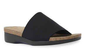 The Casita is Munro American's best selling one strap slide sandal.  Made of stretch fabric on a cork/latex combination footbed with a XL Ultralite molded EVA outsole. The EU styled footbed sandal is shock absorbent, flexible and slip resistant.   Heel height is approximately 1.5 inches.