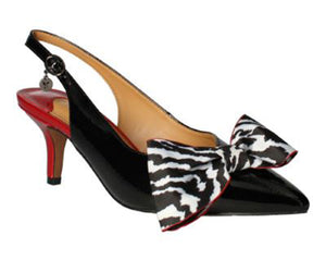 This striking pump is a showstopper.   Features patent leather with a red patent heel and beautiful bow. Heel height approximately 2.25 inches. 