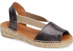 Etna is an espadrille style that enhances the earthy, vintage style of an open-toe sandal featuring a smooth leather strap.  Features elastic bands for a comfy, custom fit and a lightly padded footbed and flexible sole.  Heel height is approximatley 1.5 inches.