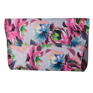 Be sophisticated and sassy in this beautiful versitle fabric convertible clutch. Wear as a simple clutch or utilize the shoulder strap for a hands free event. Perfect compliment to your wardrobe for work to play to cocktail parties. Think day dresses to denim and heels. 