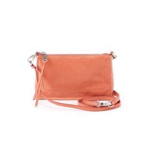 Designed for minimalists and made to hold just the necessities, the Cadence is convertible and made to be a crossbody or long shoulder bag.  Features front wall slip pocket and back wall cell pocket.