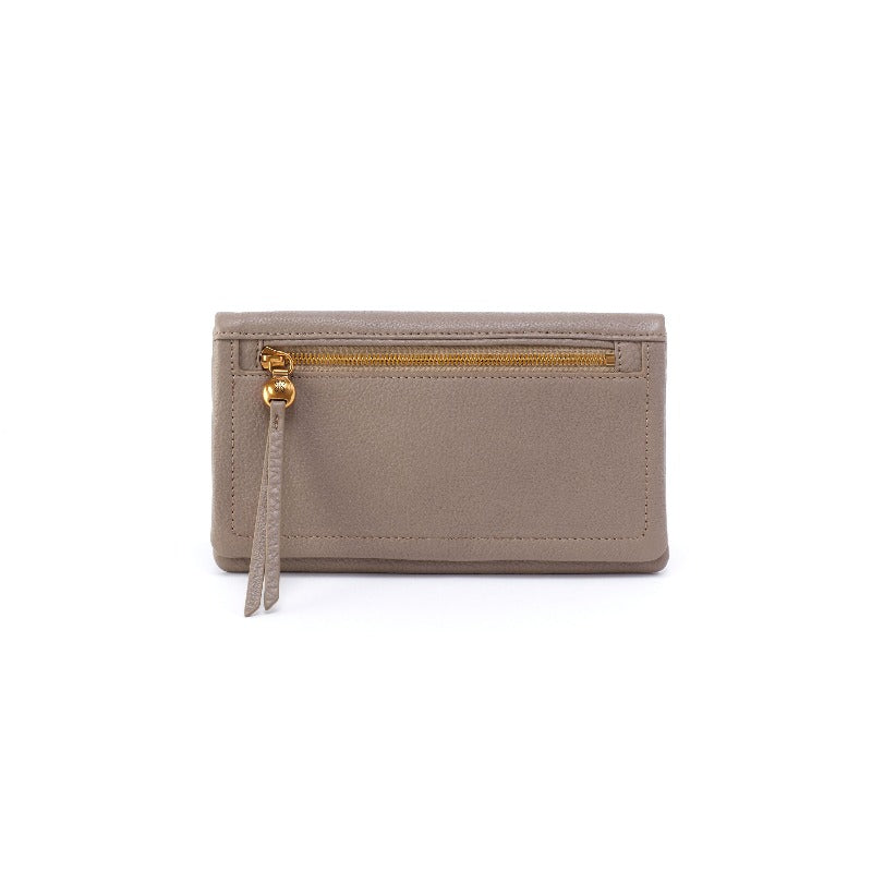 Meet Lumen, a bifold leather wallet designed for the woman on the go with a leather tassel zipper pull for the perfect balance of function and cool. Crafted in our Velvet Pebbled Hide, our softest and most casual leather that only gets more beautiful over time.
