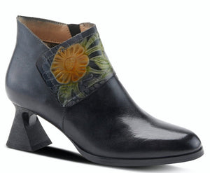 The Inspiration is a French inspired high quality leather bootie featuring floral embossed design and inside zipper for easy on and off on an architectural heel. Features leather lining, velvet insole, rubber outsole, zipper closure, padded insole and hand painted. 