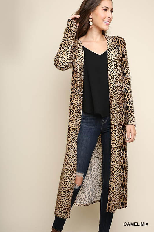 Beautiful open long body cardigan with side slits.  Made of 95% polyester and 5% spandex.