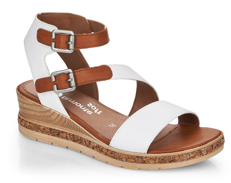 The Jerilyn by Rieker is a fun strappy sandal and part of the Remonte collection. A low, lightweight wedge sandal with a velvety molded footbed features dual adjustable straps for easy comfort and style.  Heel height is approximately 2 inches.