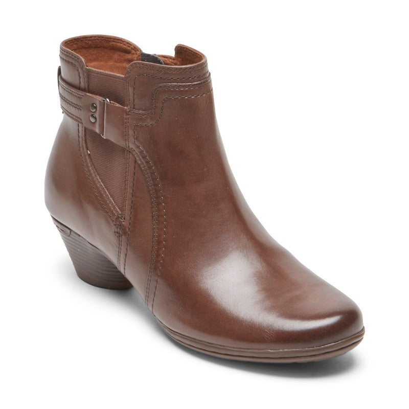 Reach a high point with the Cobb Hill Laurel Bootie. An elegant cone heel provides lift, while the molded microfiber footbed and TPR outsole add support, shock absorption and stability. Full-grain antiqued leathers complete this dressy casual look. Heel height approximately 1.5 inches.