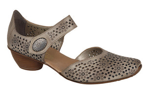 Channel your inner fashionista with the Rieker Mirjam 11.  Laser cut details highlight the premium leather upper.  Instep strap has an adjustable closure with a decorative medallion.  Soft leather footbed provides cushioning, support and all-day comfort.  Heel height is approximately 1.25 inches.