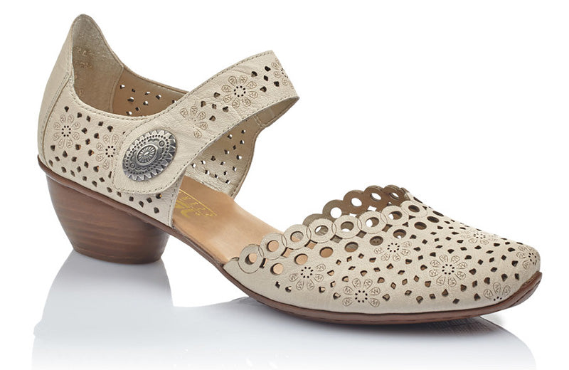 Channel your inner fashionista with the Rieker Mirjam.  Laser cut details highlight the premium leather upper.  Instep strap has an adjustable closure with a decorative medallion.  Soft leather footbed provides cushioning, support and all-day comfort.  Heel height is approximately 1.25 inches.
