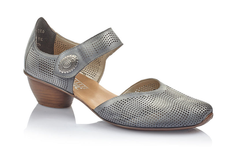 Channel your inner fashionista with the Rieker Mirjam.  Laser cut details highlight the premium leather upper.  Instep strap has an adjustable closure with a decorative medallion.  Soft leather footbed provides cushioning, support and all-day comfort.  Heel height is approximately 1.25 inches.
