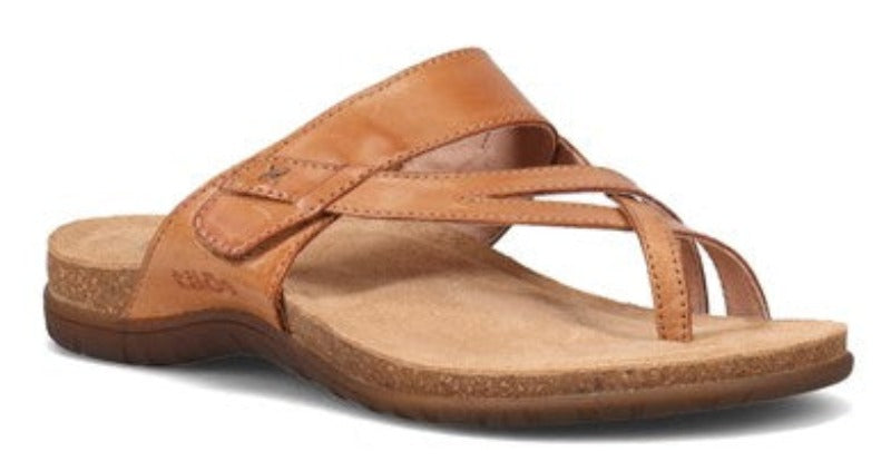 The Perfect by Taos® Footwear is a beautifully crafted and truly versatile sandal that can be worn any time, any place. Easy slide on/off with single hook-and-loop adjustable strap across arch for enhanced fit. A premium leather toe loop style thong sandal with strappy upper design. Constructed with lightweight cork-latex midsoles and soft padded and lined in luxurious suede footbed. Heel height is approximately 1 inch