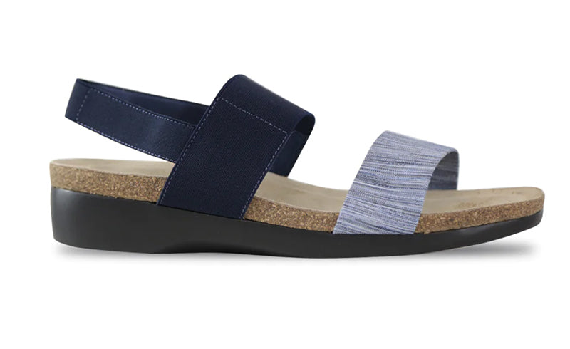 The Munro American Pisces is made of blue multi fabric on a cork/latex combination footbed with a XL Ultralite outsole. The EU styled footbed sandal is shock absorbent, flexible and slip resistant.  Heel height is approximately 1.5 inches.