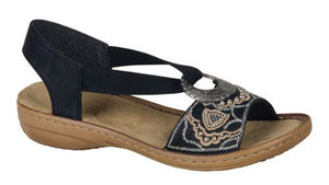 The Rieker Regina B9 sandal is fun.  This lightweight, extra flexible sandal encourages natural motion and makes it easy to be on your feet all day long.  Features a leather upper with a decorative design.  Elastic straps allow for a personalized fit.  The heel height is approximately 1 inch.