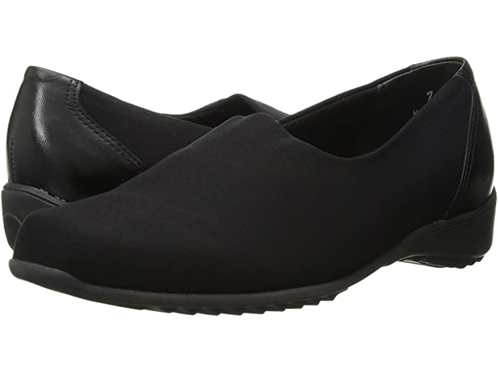 The Munro Traveler (perfectly named) is awesome for when a sneaker just won't work.  Made in black stretch fabric with matching heel cover.  Perfect for walking or traveling.  When you need a tailored shoe, this is the one for you.  It is on the exclusive Munro Tech Sole, shock absorbent, flexible, slip resistant on a light weight wedge heel. 