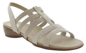 A strappy sandal is balanced with a breathable lining and supportive footbed for daylong comfort.  Features elastic straps, cushioned footbed with arch support and flexible rubber sole.  Heel height is approximately 1.25 inches..