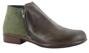 The Naot Helm is the perfect bootie with double zippers for accessibility.  The Helm has a padded heel cup & instep for  ultimate comfort.  This boot has padded technical lining for comfort, warmth and moisture absorption.  Naot's removable, anatomic cork & latex footbed is wrapped in microfiber & leather and molds to the shape of the foot with wear. 