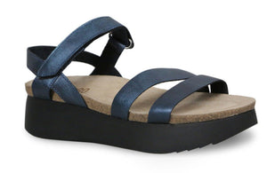 Go to new heights in the Juniper.  This style is a clean strappy sandal on a platform.  Features a contoured cork footbed with suede sock cover, hook and loop closure and ExtraLight molded EVA bottom with platform balanced strike zones with toe lift and ease of gate. Heel height approximately 2 inches.