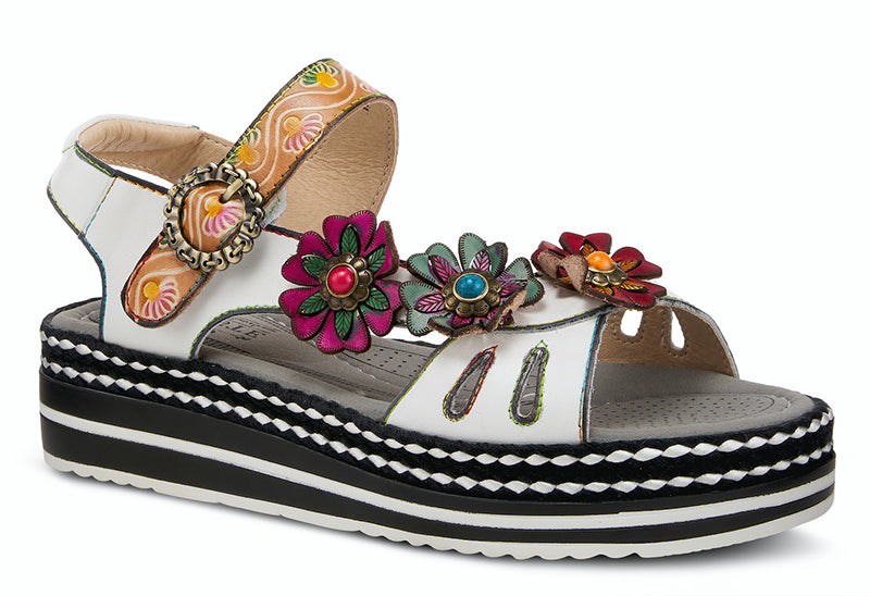 Super cushioned arch supported footbed with padded back strap and a trio of fun asymmetrical straps. Features teardrop front cutouts, hand painted wavy hook and loop closure and a circular chain embossed buckle. Heel height is approximately 1.75 inches.