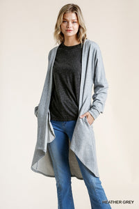 French terry raw edged open front cardigan with high/low hem. 82% Cotton 18% Polyester.