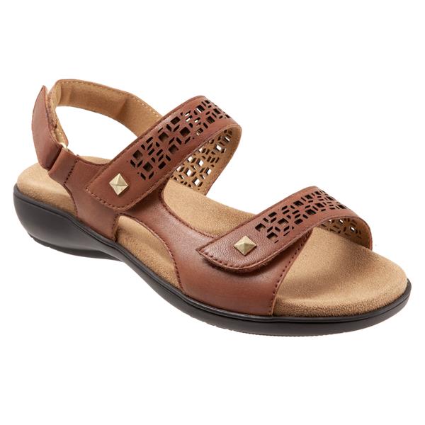 Perforated patterns and diamond edge stud hardware accentuate the adjustable straps of the Romi sandal. Romi also features a soft, comfortable footbed and flexible sole. Features Memory Foam, leather upper and a lightweight rubber sole. Heel height is approximately 1.25 inches.