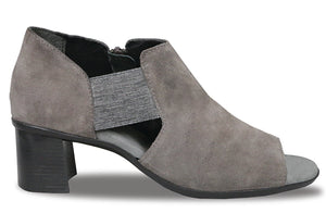 The Sable is a contemporary shootie that covers many seasons.  The peep toe and open sides add to the style with an elasticized band that beautifully adds to the fit of the shoe.  Features and inside zipper for easy on and off, soft knit lining and a shock absorbing rubber outsole.  Heel height is approximately 1.75 inches.